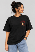 Front view of black oversized T-shirt with small red and beige chest graphic